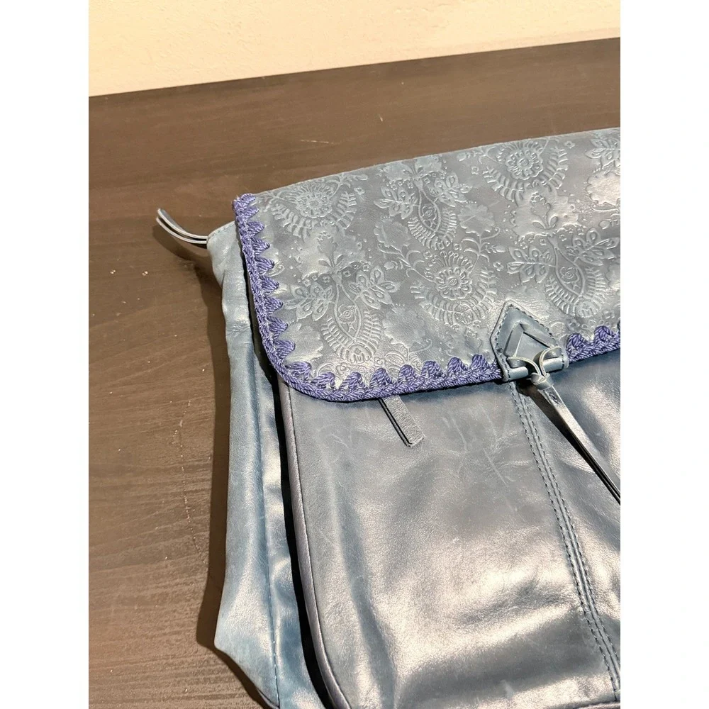The Sak Ventura Slate Blue Leather Embossed Floral Convertible Backpack Bag